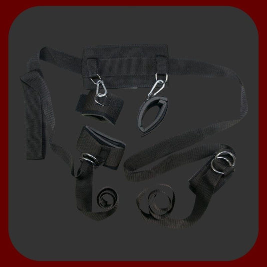 Černý BDSM postroj s polstrovanými uzávěry na suchý zip pro bezpečné uzamčení krku, rukou a nohou.