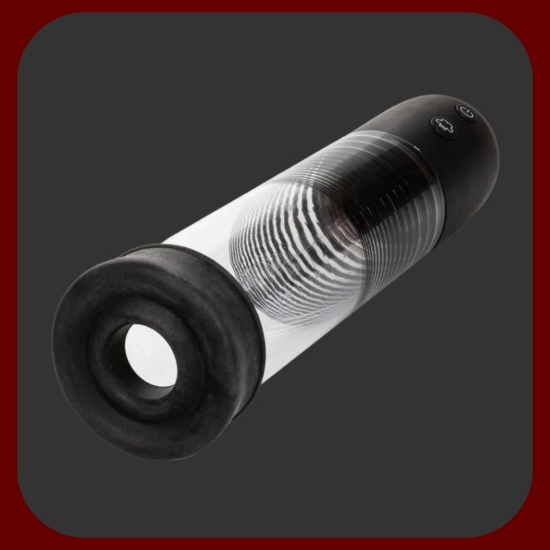 Automatická pumpa na penis CalExotics s USB dobíjením, silikonovým návlekem a dvojitým kroužkem v černé a průhledné barvě.