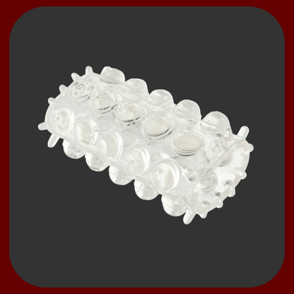 Průhledný stimulační návlek na penis s ultra stimulačním povrchem, vyrobený z měkkého elastického materiálu, 6,5 x 3 cm.