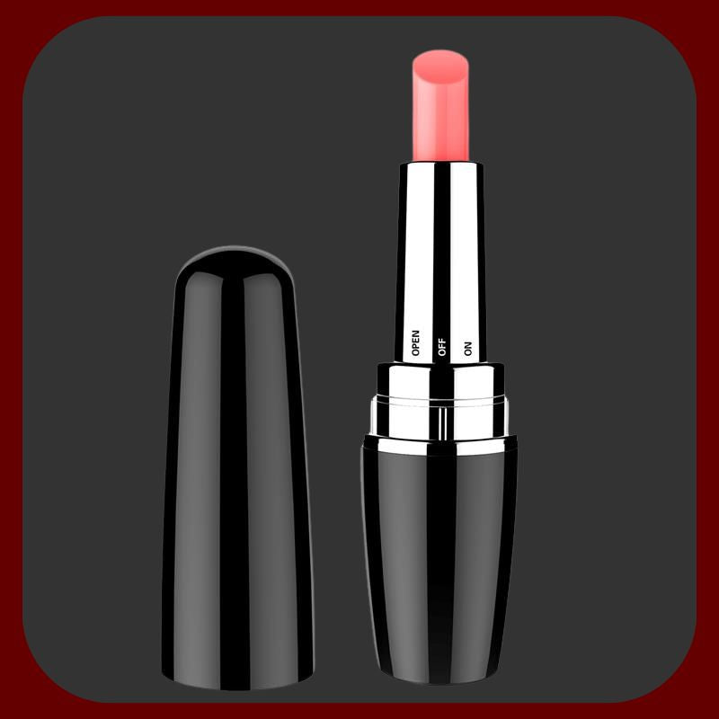 Diskrétní vibrátor Secret Kiss ve tvaru rtěnky, ve fialové a černé barvě, ideální pro klitorální stimulaci, délka 9,5 cm, průměr 2,6 cm.