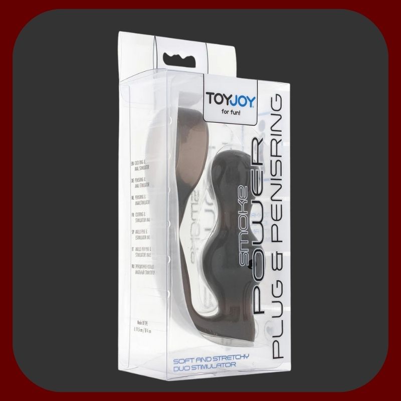 Šedý stimulační kolík na prostatu s elastickým erekčním kroužkem a vibracemi pro intenzivní mužskou stimulaci a pevnou erekci.